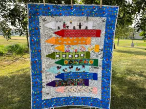 Crayons and Newsprint Rainbow Baby Quilt